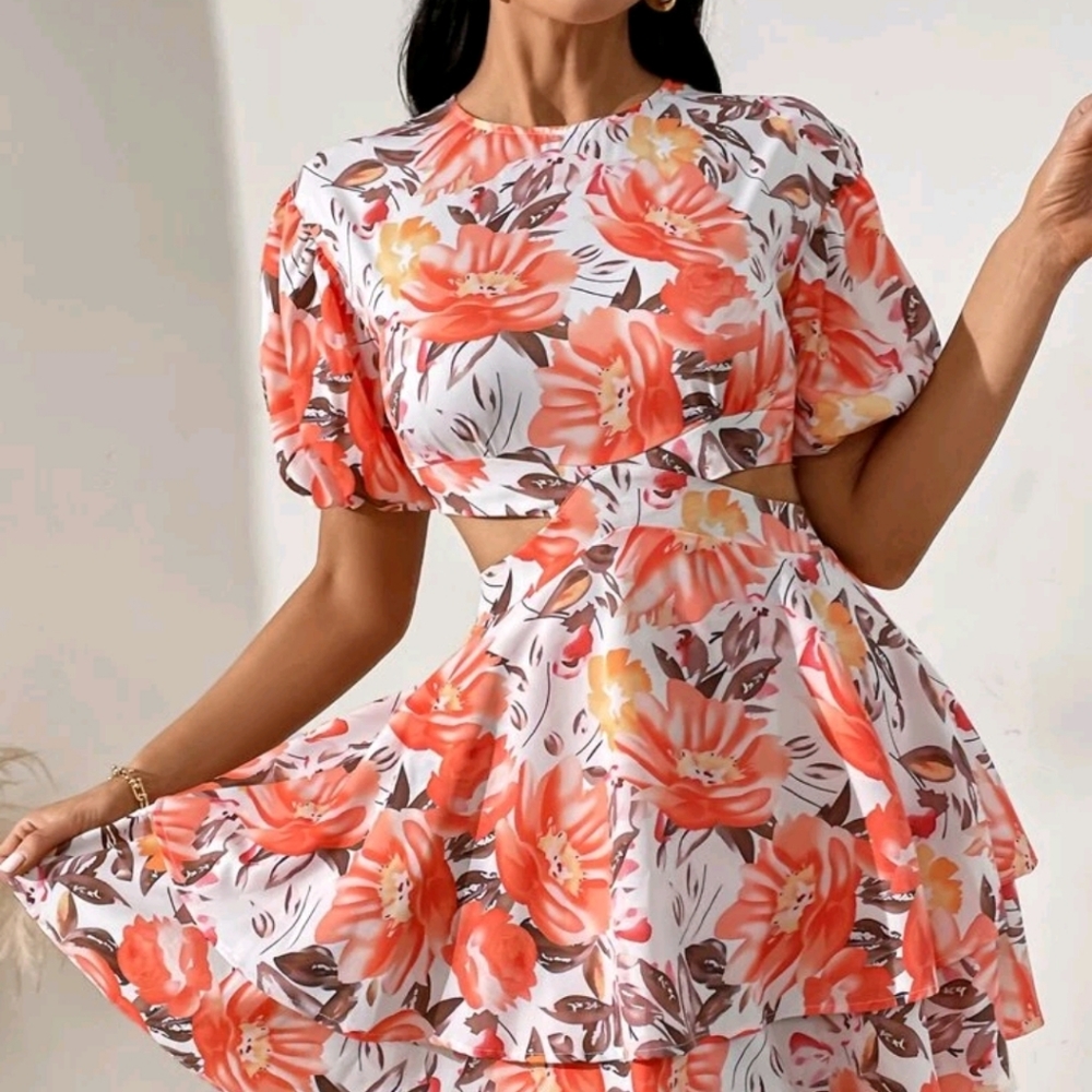 Brand new, Beautiful, Vibrant Cut out dress.